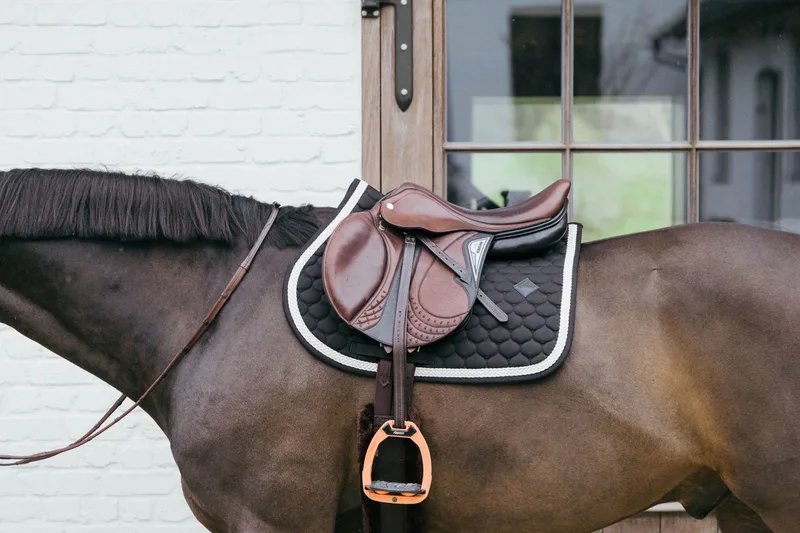 Zadeldoek - met gevlochten koord - Zadeldekje - Jumping by Kentucky Horsewear in Black – product photo